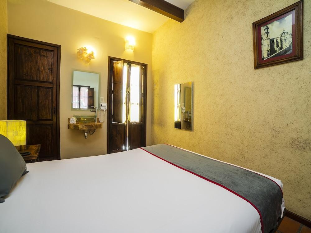 Collection O Al Otro Lado Del Rio, Puebla Hotel Bagian luar foto A room at the hotel