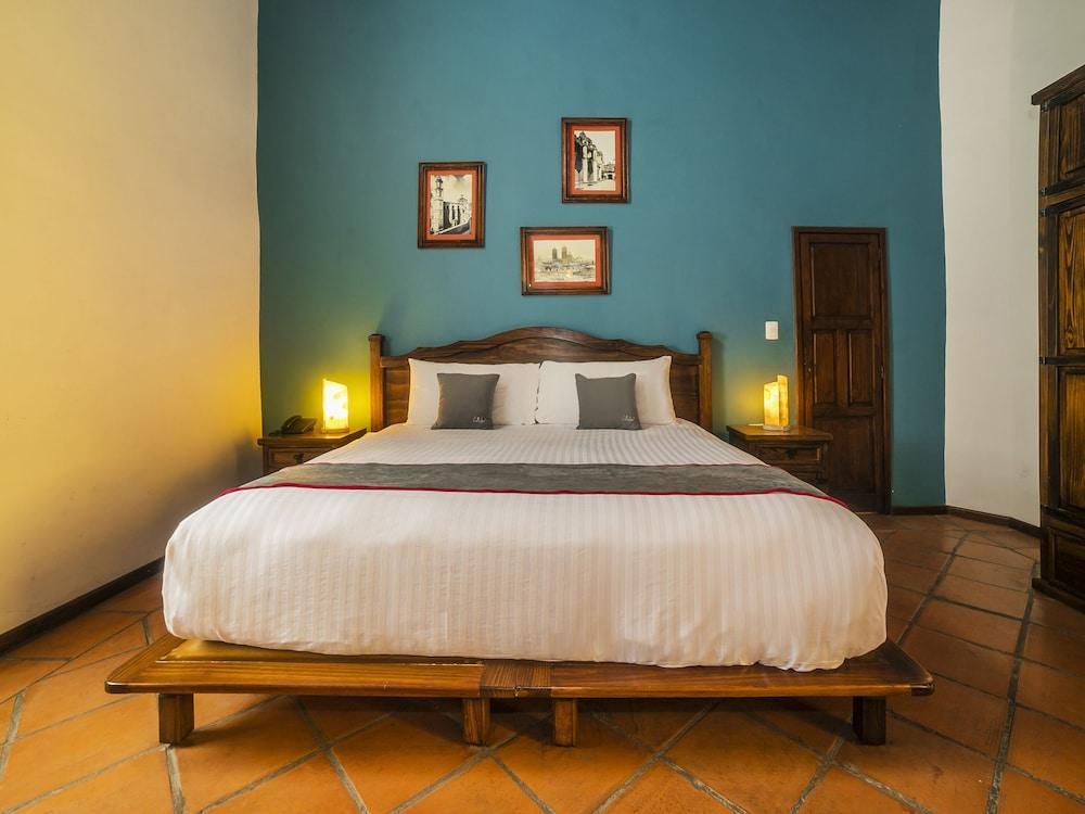 Collection O Al Otro Lado Del Rio, Puebla Hotel Bagian luar foto A bedroom at the hotel