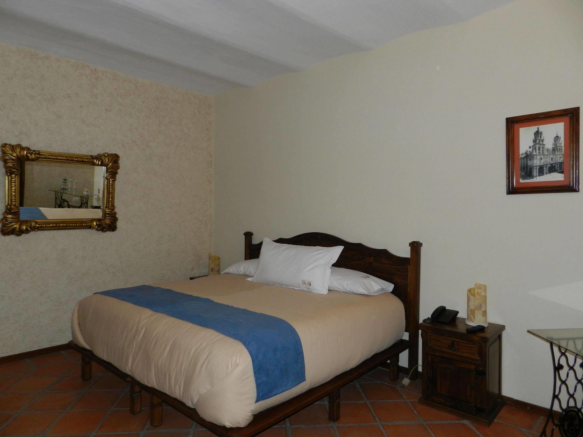 Collection O Al Otro Lado Del Rio, Puebla Hotel Bagian luar foto A room at the hotel
