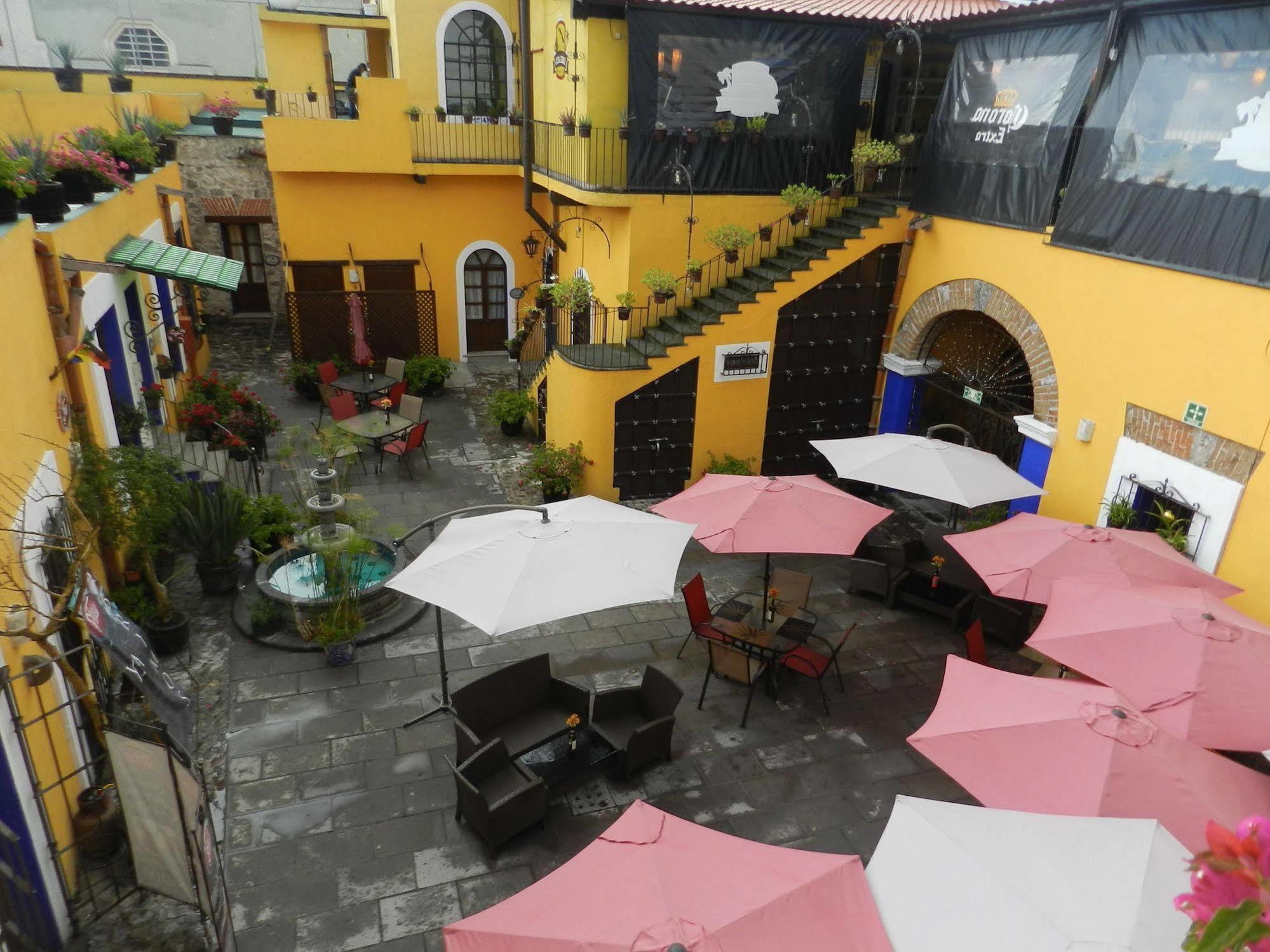 Collection O Al Otro Lado Del Rio, Puebla Hotel Bagian luar foto Patio of the restaurant