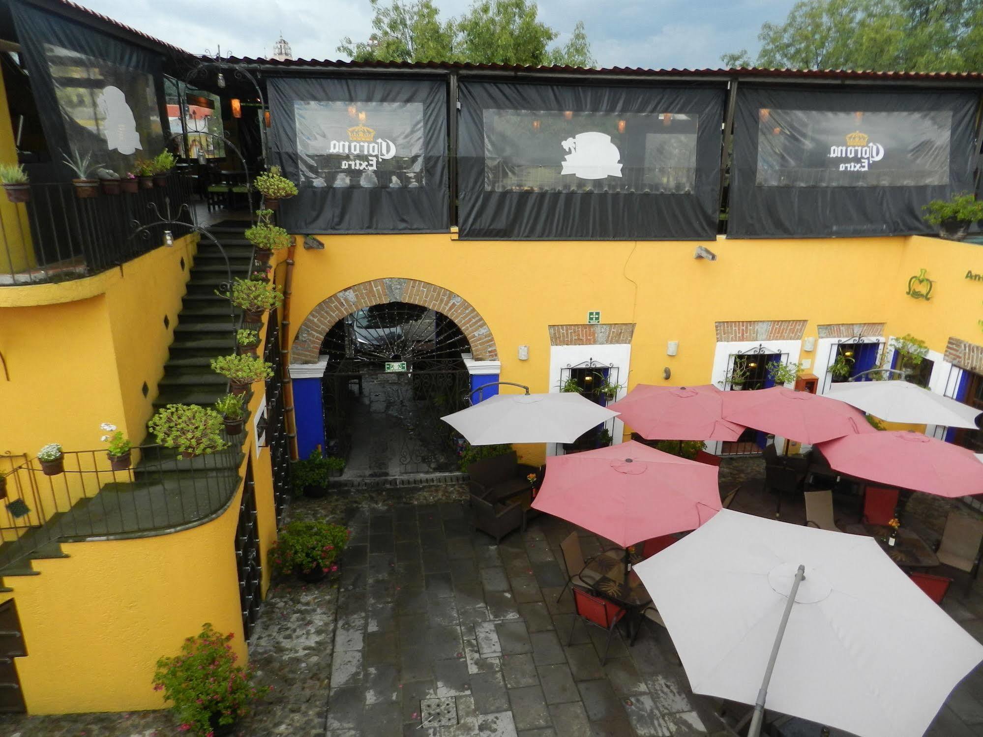 Collection O Al Otro Lado Del Rio, Puebla Hotel Bagian luar foto The restaurant's patio