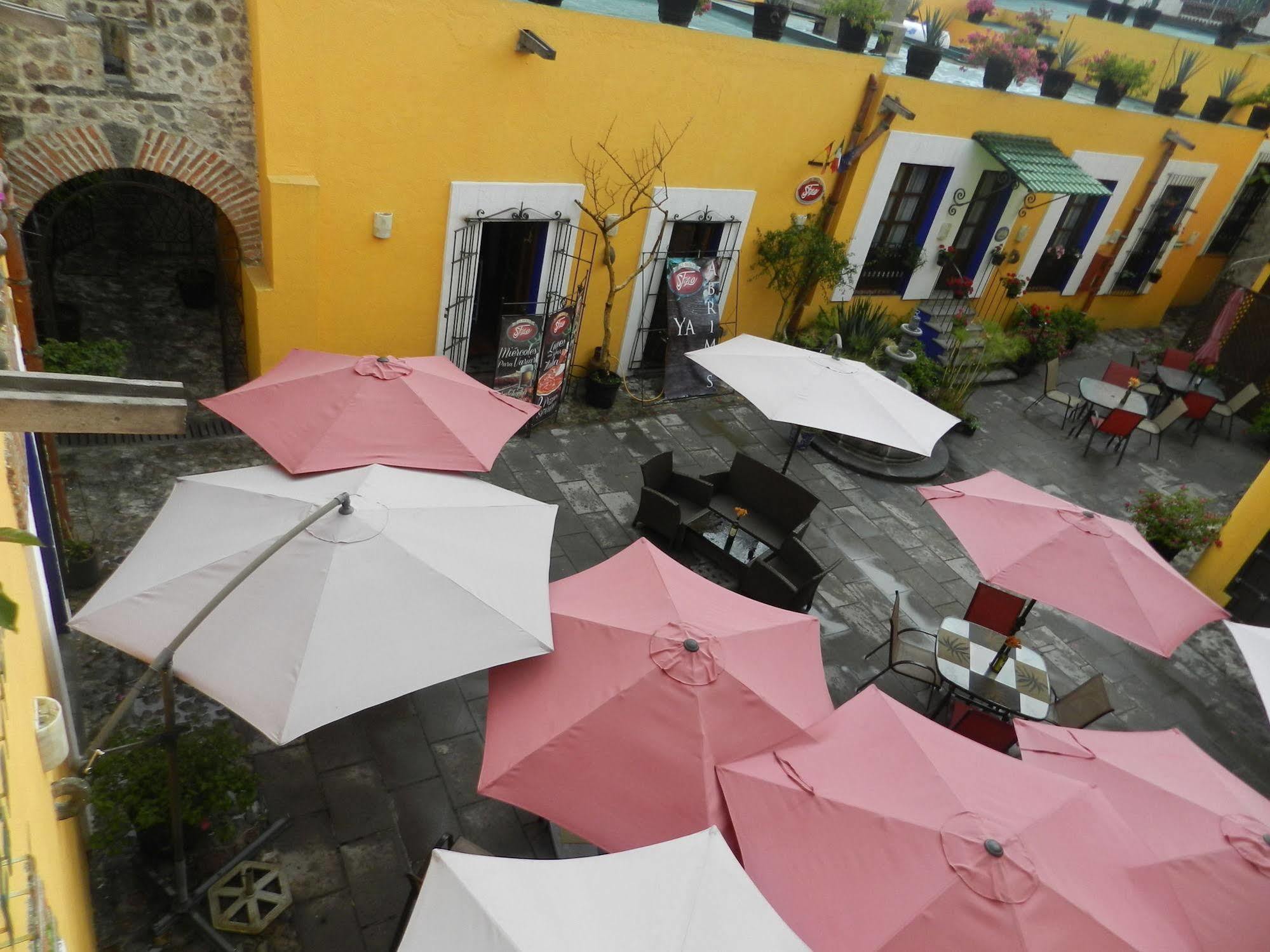 Collection O Al Otro Lado Del Rio, Puebla Hotel Bagian luar foto Patio of the Casa de Morelos